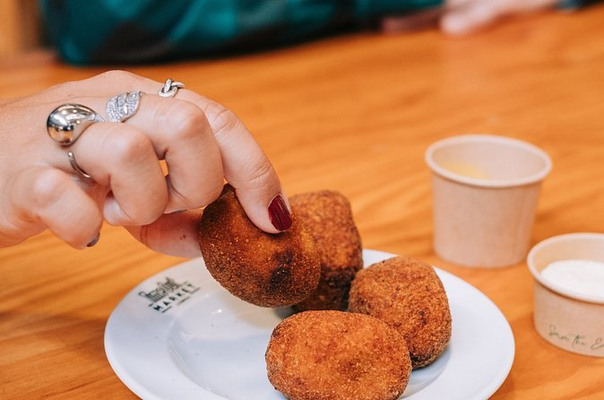 Pastéis de bacalhau, the salt-cod fritters, taken from a plate
